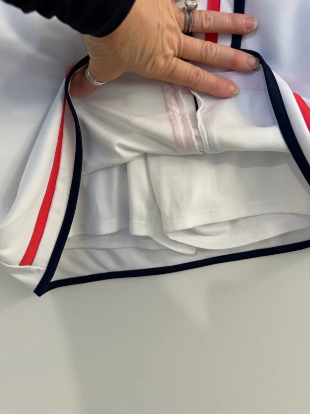 Callaway golf skirt. Size S. White with Navy/lighter red piping. - Picture 4 of 5